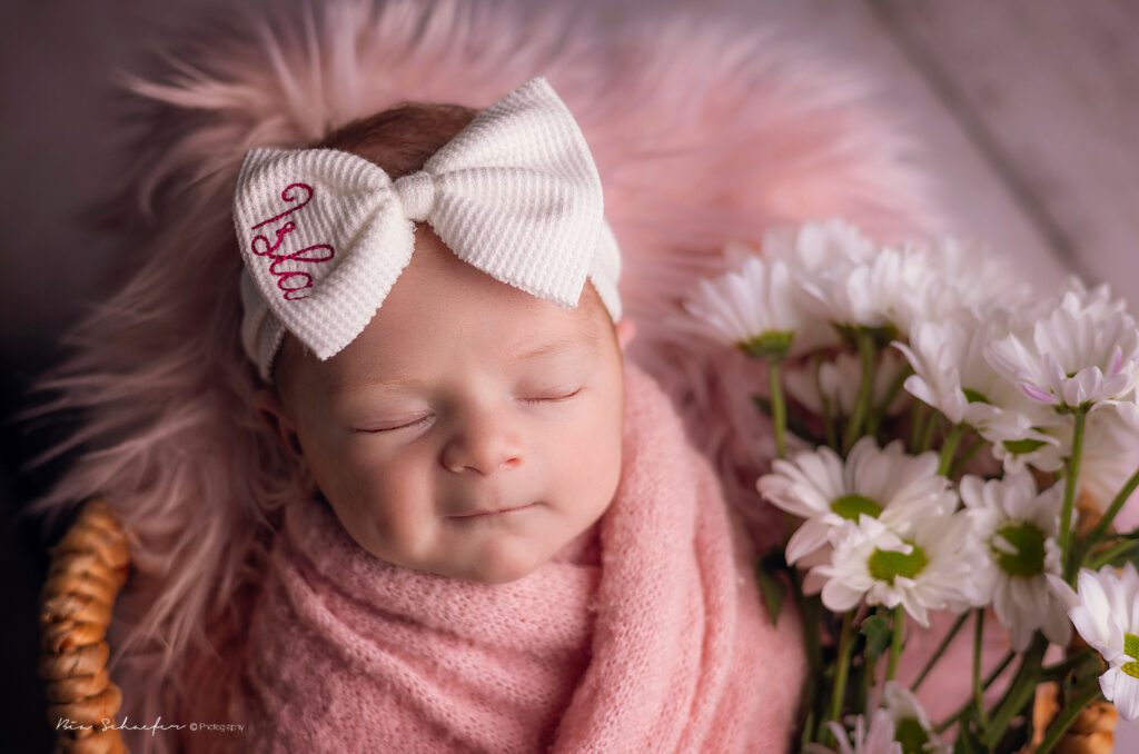 Pink flowers newborn session in Orlando, Florida. 